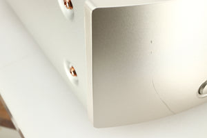 Close up of a used Marantz NA6006 Network Player in a silver finish showing scratch on fascia