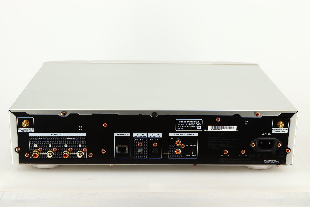 Rear view of a used Marantz NA6006 Network Player in a silver finish showing Mains Input, Optical Output, Phono Outputs and Ethernet Input