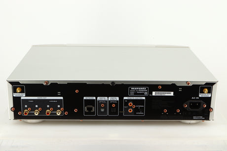Rear view of a used Marantz NA6006 Network Player in a silver finish showing Mains Input, Optical Output, Phono Outputs and Ethernet Input