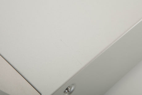 Close up of a used Marantz NA7004 Network Streamer in a Silver finish showing scratching on top