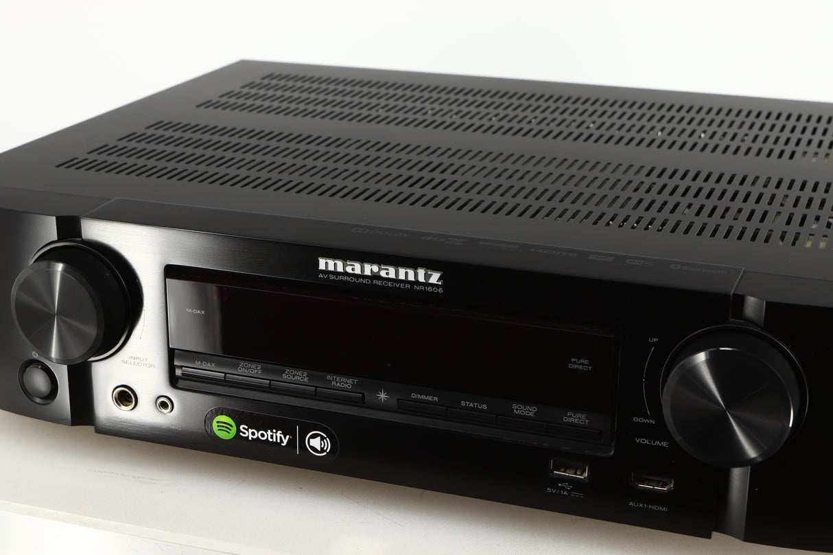 Close up of a used Marantz NR1606 AV Receiver in a black finish showing fascia