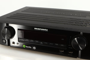 Close up of a used Marantz NR1606 AV Receiver in a black finish showing fascia