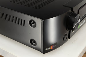 Front left corner of a used Marantz NR1606 AV Receiver in a black finish