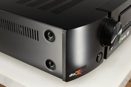 Front left corner of a used Marantz NR1606 AV Receiver in a black finish