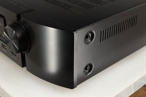 Front right corner of a used Marantz NR1606 AV Receiver in a black finish