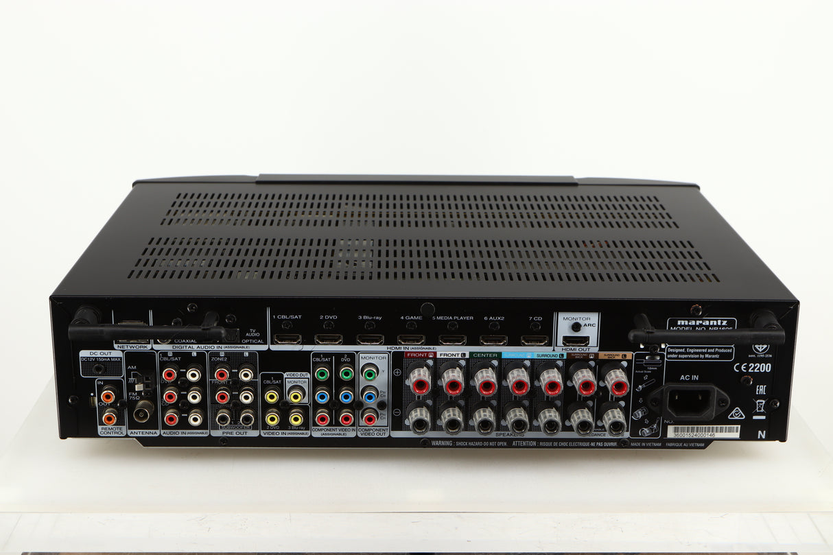 Rear view of a used Marantz NR1606 AV Receiver in a black finish showing Mains Input, Phono Inputs, Phono Outputs, HDMI Output, HDMI Inputs, Network Input, Speaker Inputs and Optical Input
