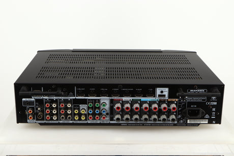 Rear view of a used Marantz NR1606 AV Receiver in a black finish showing Mains Input, Phono Inputs, Phono Outputs, HDMI Output, HDMI Inputs, Network Input, Speaker Inputs and Optical Input