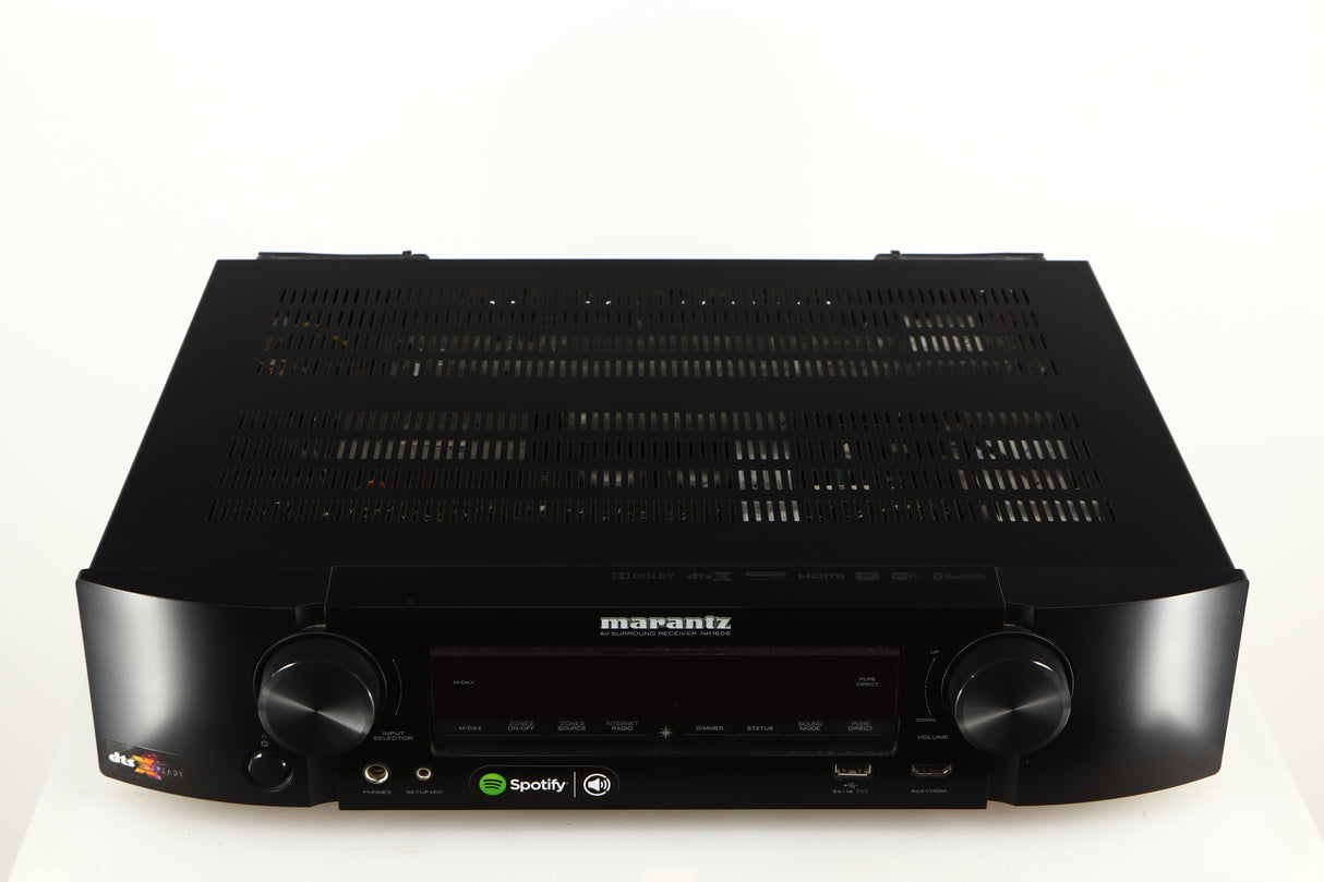 Top of a used Marantz NR1606 AV Receiver in a black finish
