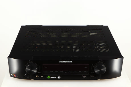 Top of a used Marantz NR1606 AV Receiver in a black finish