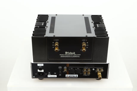 Rear view of a used McIntosh MA252 Integrated Amplifier showing Speaker outputs, XLR, mains, RCA, and phono inputs