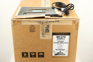 Box of a used McIntosh MC275 MK VI Power Amplifier showing Mains Cable, Manual, 2x Terminal Links, and Terminal tool