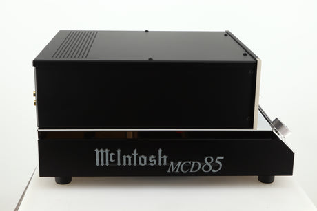 Left side view of a used McIntosh MCD85 CD / SACD Player in a silver / black finish