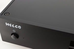 Close up view of a used Melco HA-N1Z/2EX-H60 Music Server in Black finish showing a small mark on the front edge