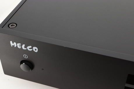 Close up view of a used Melco HA-N1Z/2EX-H60 Music Server in Black finish showing a small mark on the front edge