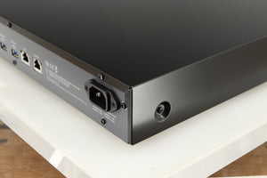 Rear left corner of a used Melco N1A Music Server in a black finish