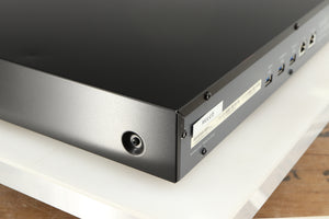 Rear right corner of a used Melco N1A Music Server in a black finish