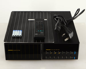 Top of a used Meridian 200 CD Transport in a black finish showing Manual, Remote, Batteries and Mains Cable