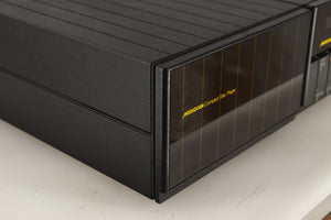 Front left corner of a used Meridian 200 CD Transport in a black finish