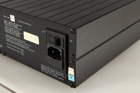 Rear left corner of a used Meridian 200 CD Transport in a black finish