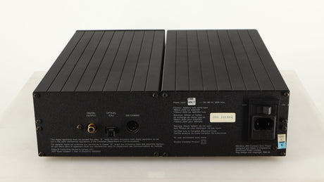 Rear view of a used Meridian 200 CD Transport in a black finish showing Mains Input, Phono Output and Optical Output