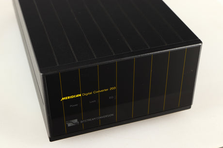 Close up of a used Meridian 203 Digital Analogue Converter in a black finish showing screen