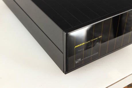 Front left corner of a used Meridian 203 Digital Analogue Converter in a black finish