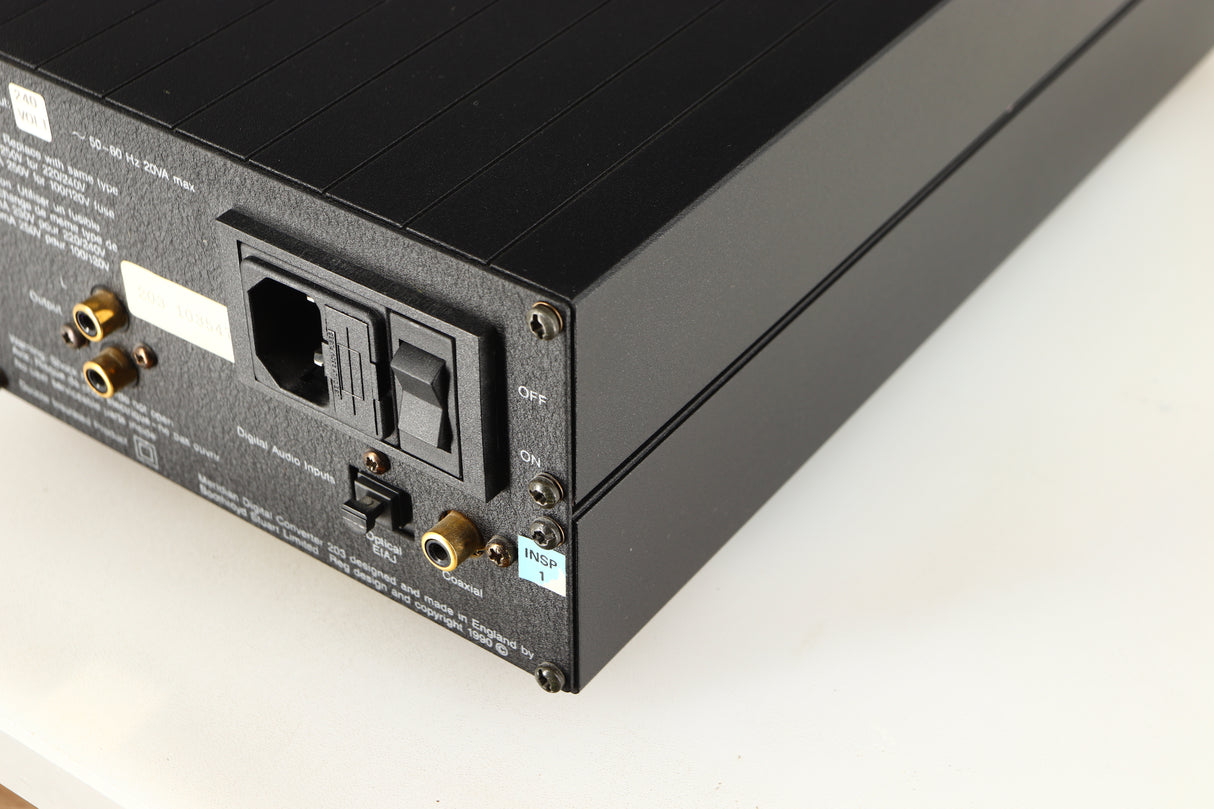 Rear left corner of a used Meridian 203 Digital Analogue Converter in a black finish