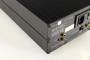 Rear right corner of a used Meridian 203 Digital Analogue Converter in a black finish
