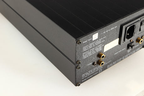 Rear right corner of a used Meridian 203 Digital Analogue Converter in a black finish