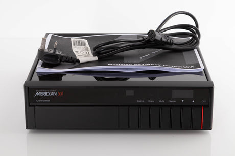 Front view of a used Meridian 501 Pre Amplifier with mains cable