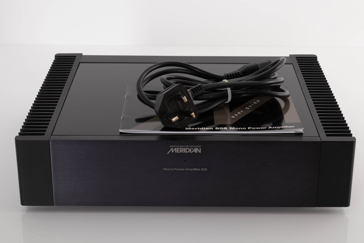 Front view of a used Meridian 505 Single Monoblock Power Amplifier with mains cable and manual
