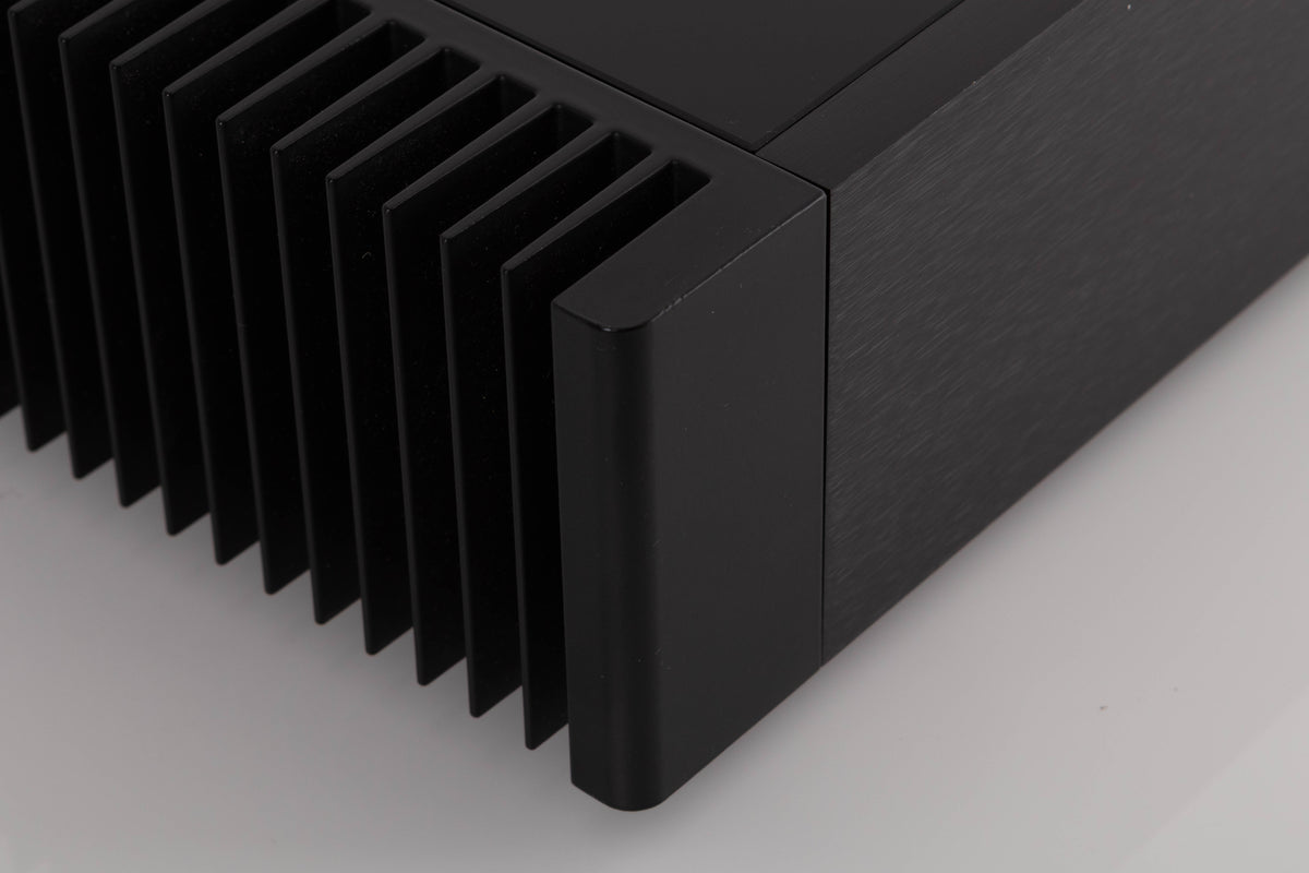 Front left corner view of a used Meridian 556 Stereo Power Amplifier
