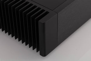 Front left corner view of a used Meridian 556 Stereo Power Amplifier