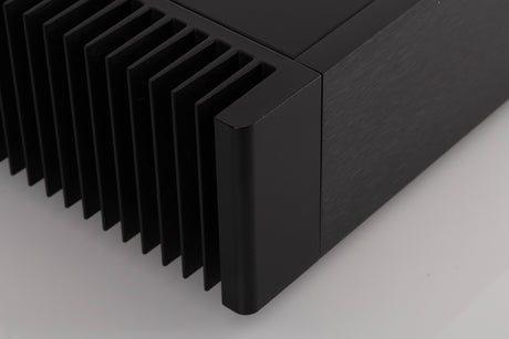 Front left corner view of a used Meridian 556 Stereo Power Amplifier
