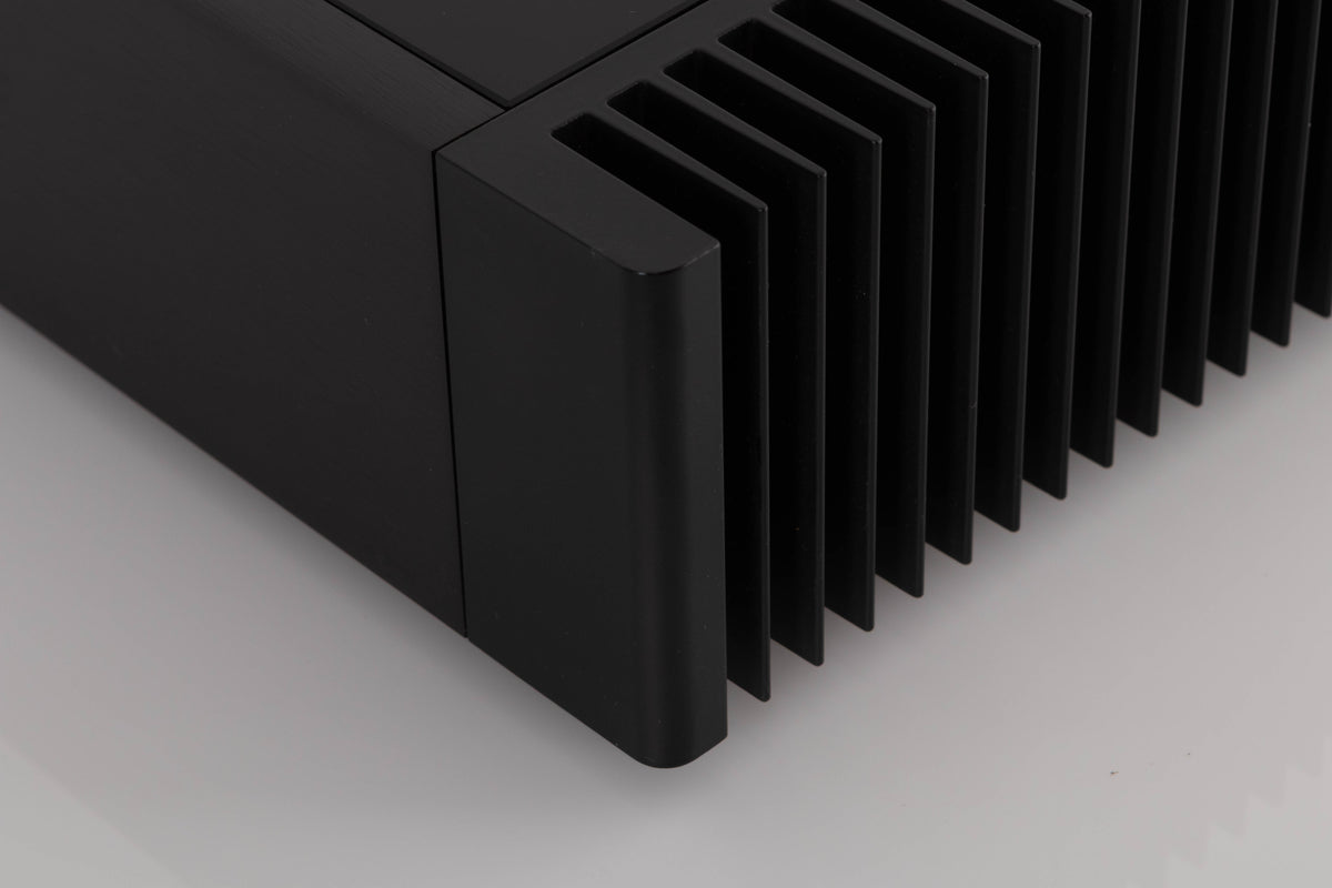 Front right corner view of a used Meridian 556 Stereo Power Amplifier