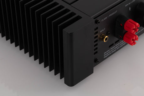 Rear left corner view of a used Meridian 556 Stereo Power Amplifier