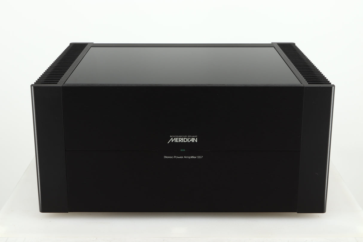 Front view of a used Meridian 557 Power Amplifier in a black finish