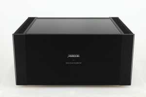 Front view of a used Meridian 557 Power Amplifier in a black finish