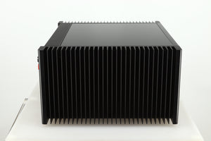 Left side view of a used Meridian 557 Power Amplifier in a black finish