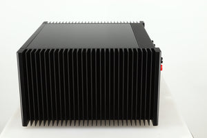 Right side view of a used Meridian 557 Power Amplifier in a black finish