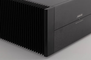 Front left corner view of a used Meridian 557 Stereo Power Amplifier