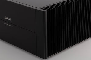 Front right corner view of a used Meridian 557 Stereo Power Amplifier