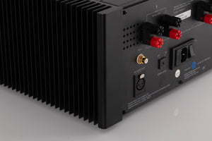 Rear left corner view of a used Meridian 557 Stereo Power Amplifier