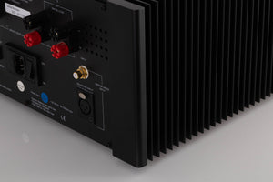 Rear right corner view of a used Meridian 557 Stereo Power Amplifier