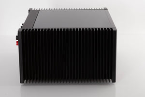 Side view of a used Meridian 557 Stereo Power Amplifier