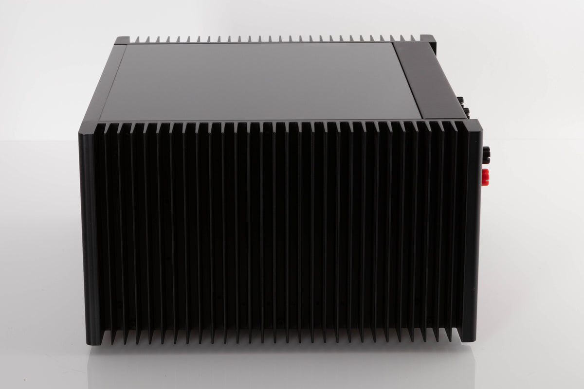 Side view of a used Meridian 557 Stereo Power Amplifier