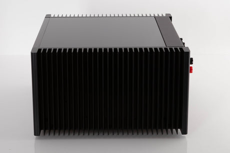 Side view of a used Meridian 557 Stereo Power Amplifier
