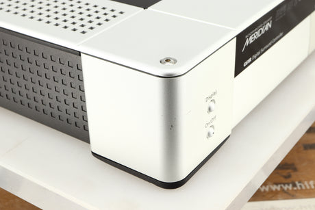 Front left corner of a used Meridian G61R Controller in a silver finish