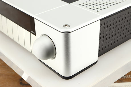 Front right corner of a used Meridian G61R Controller in a silver finish