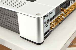 Rear right corner of a used Meridian G61R Controller in a silver finish